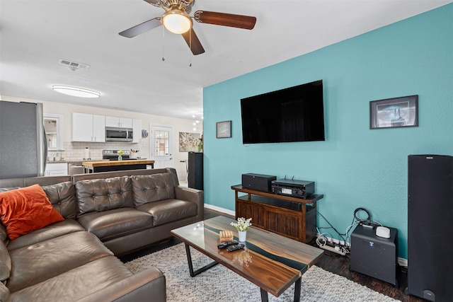 4204 Geddes Ave, Fort Worth, TX 76107 - living area with wood finished floors and ceiling fan