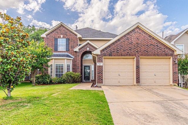 1617 Wood Ridge Ct, Corinth, TX 76210 - traditional-style house with brick siding, driveway, an attached garage, and a front lawn