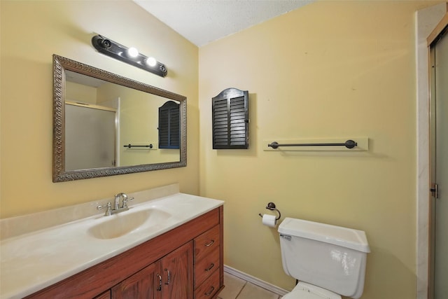 2015 Shenandoah Dr, Carrollton, TX 75007 - bathroom with a shower stall, vanity, and tile patterned floors