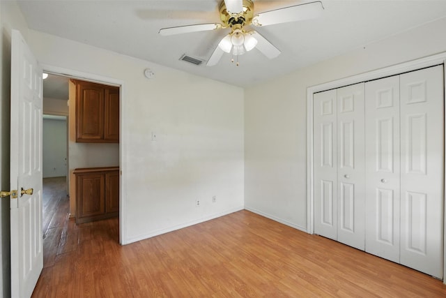 2015 Shenandoah Dr, Carrollton, TX 75007 - unfurnished bedroom featuring light wood-style flooring, a closet, and ceiling fan