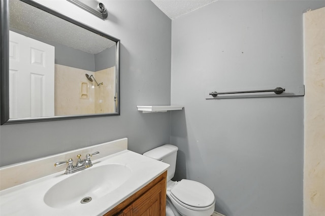 2015 Shenandoah Dr, Carrollton, TX 75007 - bathroom with vanity and a textured ceiling