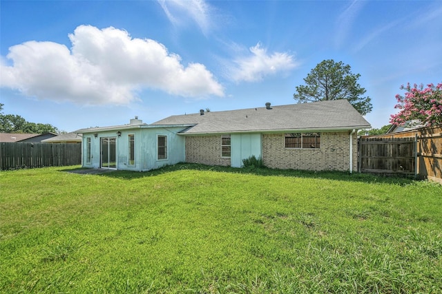 2015 Shenandoah Dr, Carrollton, TX 75007 - rear view of house with a fenced backyard, a chimney, and brick siding