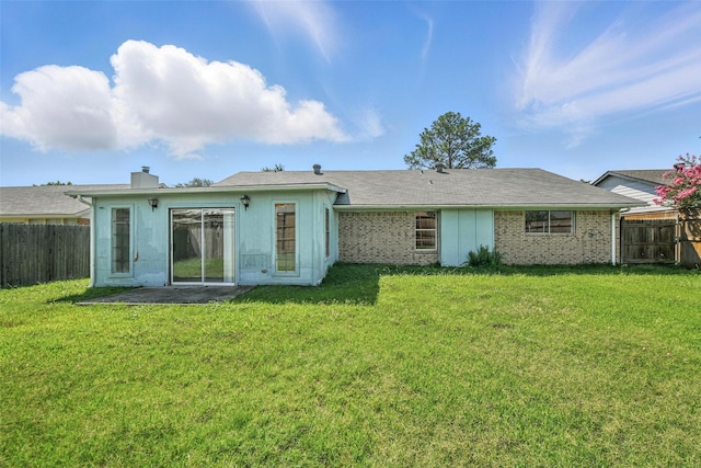 2015 Shenandoah Dr, Carrollton, TX 75007 - rear view of house with a chimney