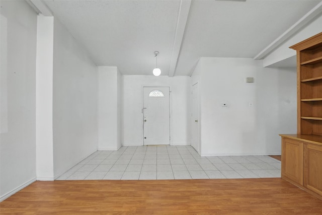 2015 Shenandoah Dr, Carrollton, TX 75007 - entryway with light tile patterned flooring and baseboards