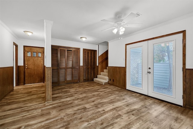 1632 Andy Dr, Sherman, TX 75092 - entryway featuring french doors, wooden walls, a wainscoted wall, wood finished floors, and ornamental molding