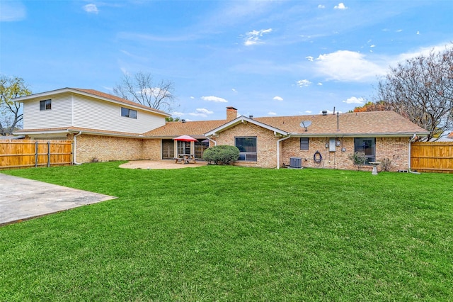 1632 Andy Dr, Sherman, TX 75092 - rear view of house featuring a patio area, a fenced backyard, a chimney, and brick siding
