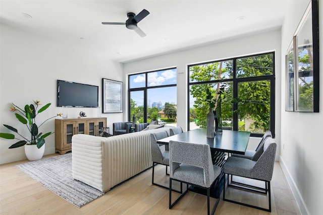 430 E 8th Unit 101, Dallas, TX 75203 - living area featuring ceiling fan and light wood finished floors
