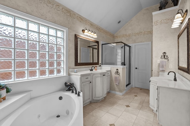 5820 Woodwind Dr, Plano, TX 75093 - bathroom with vaulted ceiling, a stall shower, tile patterned flooring, a whirlpool tub, and two vanities