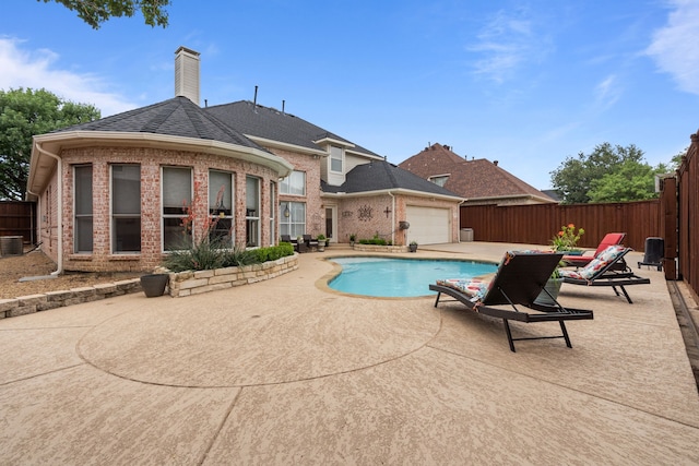 5820 Woodwind Dr, Plano, TX 75093 - view of pool with a fenced backyard and a patio