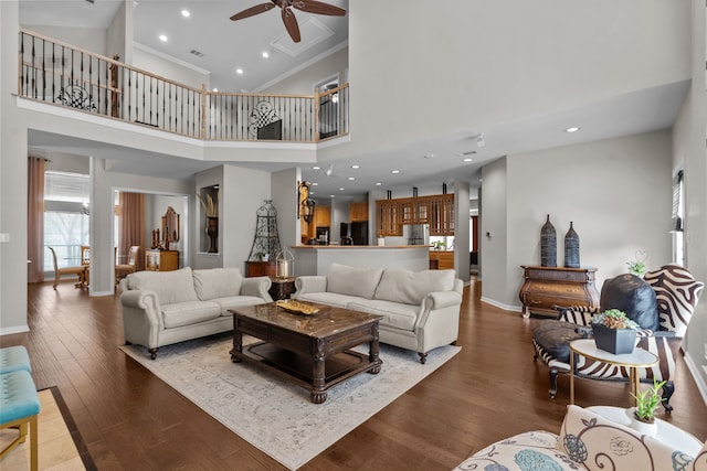 5820 Woodwind Dr, Plano, TX 75093 - living area with a ceiling fan, a high ceiling, wood finished floors, recessed lighting, and crown molding