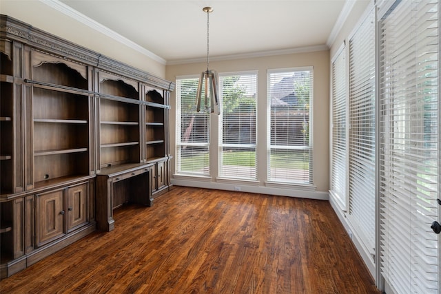 11560 Mirage Ln, Frisco, TX 75033 - unfurnished dining area with dark wood-type flooring and crown molding