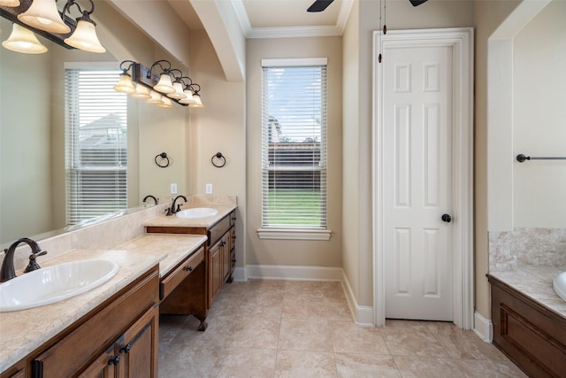 11560 Mirage Ln, Frisco, TX 75033 - full bath featuring crown molding, vanity, healthy amount of natural light, a ceiling fan, and a bathtub
