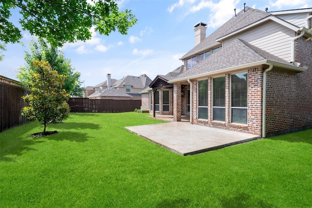 11560 Mirage Ln, Frisco, TX 75033 - fenced backyard featuring a patio area