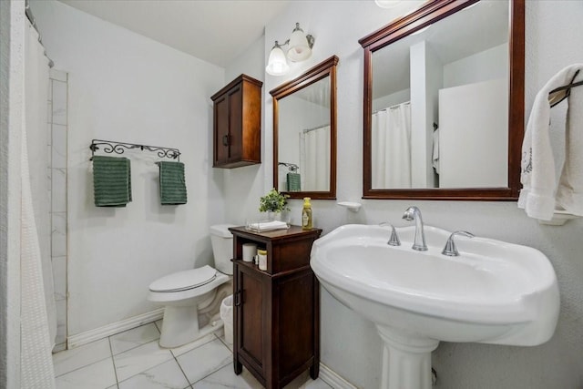 7920 Donegal Ln, North Richland Hills, TX 76180 - bathroom featuring toilet and marble look tile flooring