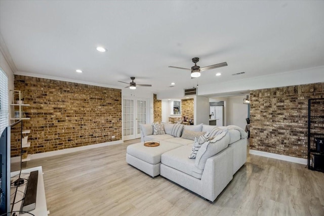 7920 Donegal Ln, North Richland Hills, TX 76180 - living area with brick wall, ceiling fan, light wood finished floors, recessed lighting, and ornamental molding