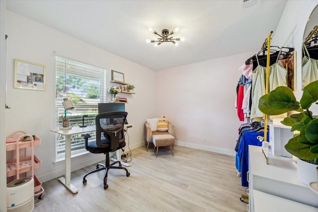 7920 Donegal Ln, North Richland Hills, TX 76180 - office area featuring a chandelier and light wood-style floors