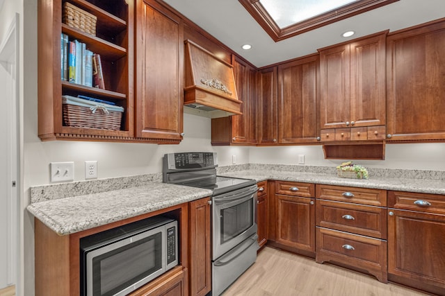 2305 Delmar Dr, Plano, TX 75075 - kitchen featuring stainless steel appliances, open shelves, light wood-style flooring, recessed lighting, and brown cabinetry
