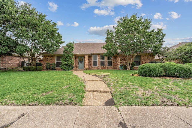2305 Delmar Dr, Plano, TX 75075 - ranch-style house with brick siding, a front lawn, and a shingled roof