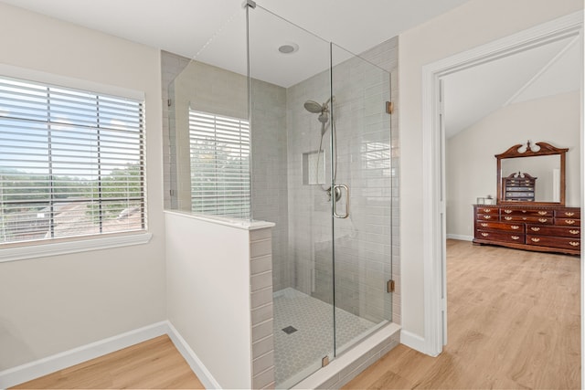 2305 Delmar Dr, Plano, TX 75075 - full bathroom featuring wood finished floors and a stall shower