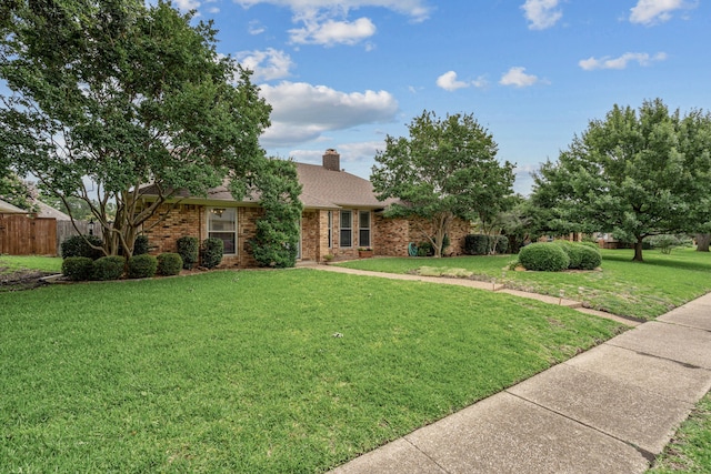 2305 Delmar Dr, Plano, TX 75075 - view of front of property with brick siding, a chimney, and roof with shingles