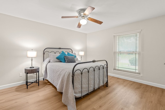 2305 Delmar Dr, Plano, TX 75075 - bedroom featuring light wood-style floors and a ceiling fan