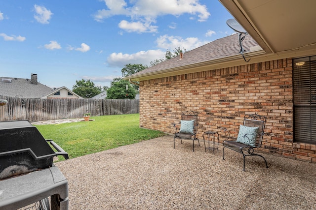 2305 Delmar Dr, Plano, TX 75075 - fenced backyard with a patio area