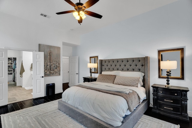 1809 Lake Glen Trl, Mansfield, TX 76063 - bedroom featuring a towering ceiling, wood finished floors, ceiling fan, and a spacious closet