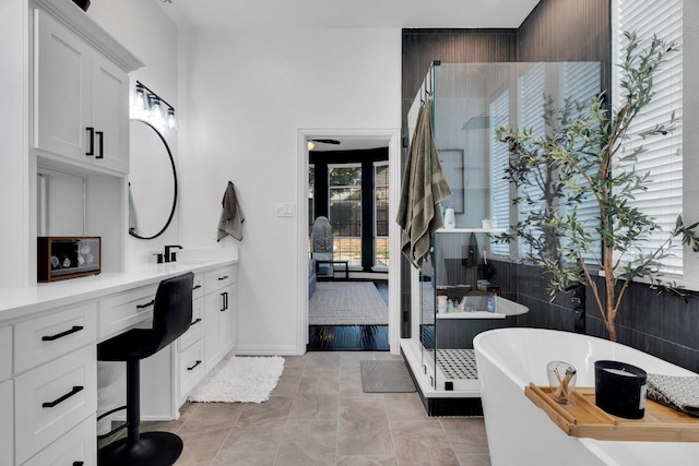 1809 Lake Glen Trl, Mansfield, TX 76063 - full bath featuring vanity, a stall shower, a soaking tub, and connected bathroom