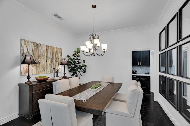 1809 Lake Glen Trl, Mansfield, TX 76063 - dining space with dark wood-type flooring, a chandelier, and ornamental molding