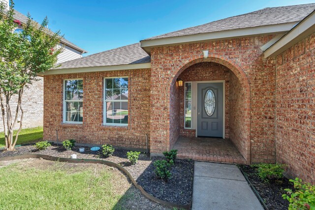 1940 Creek Crossing Dr, Fort Worth, TX 76247 - property entrance with brick siding and roof with shingles