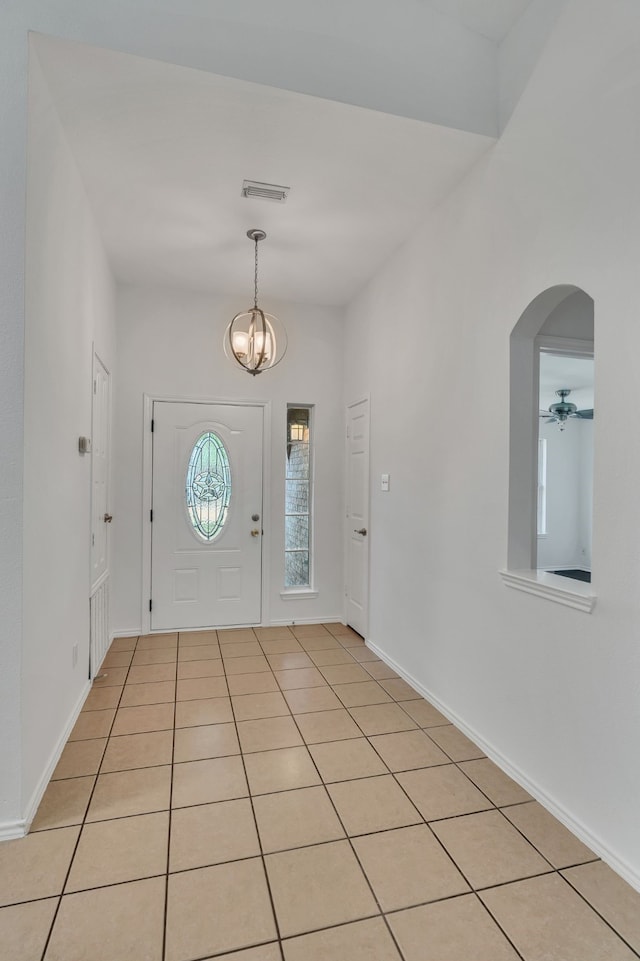1940 Creek Crossing Dr, Fort Worth, TX 76247 - entrance foyer with arched walkways and a chandelier