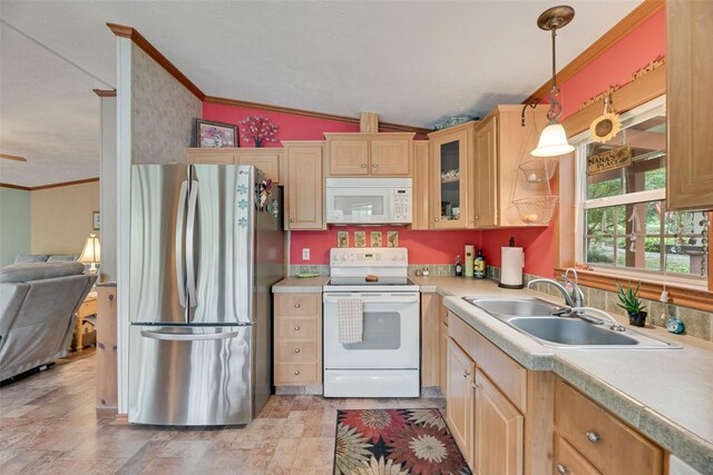 200 Dogwood Trl, Murchison, TX 75778 - kitchen with white appliances, ornamental molding, light countertops, decorative light fixtures, and glass insert cabinets