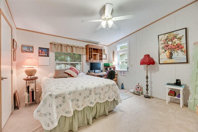 200 Dogwood Trl, Murchison, TX 75778 - bedroom with light colored carpet, vaulted ceiling, crown molding, a ceiling fan, and an office area