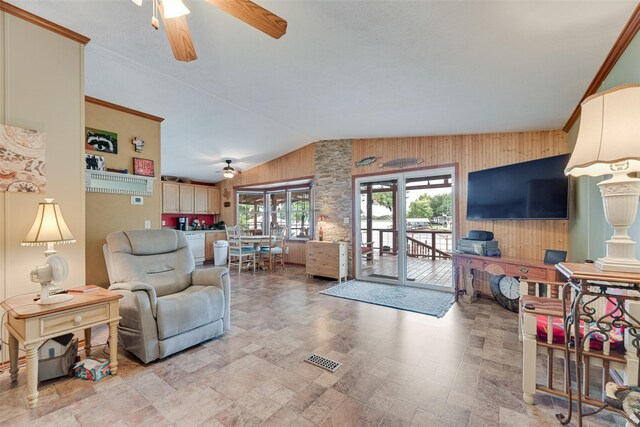 200 Dogwood Trl, Murchison, TX 75778 - living room featuring ceiling fan, wood walls, and vaulted ceiling