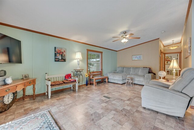 200 Dogwood Trl, Murchison, TX 75778 - living area with ornamental molding, stone finish floors, ceiling fan, and lofted ceiling