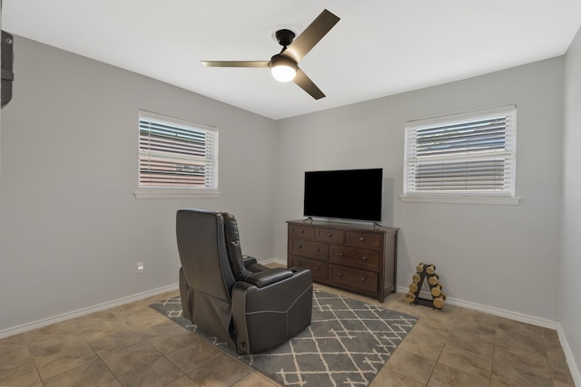 7424 Bridges Ave, Richland Hills, TX 76118 - living area featuring a ceiling fan and tile patterned flooring