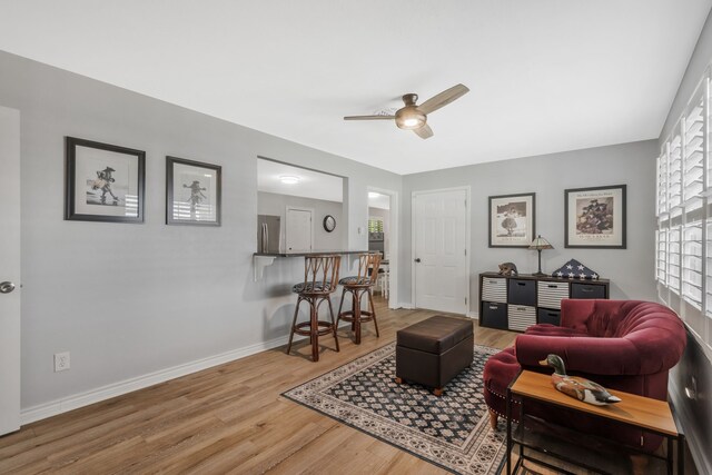 7424 Bridges Ave, Richland Hills, TX 76118 - living room featuring wood finished floors and ceiling fan