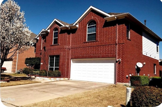 4924 Marsh Harrier Ave, Grand Prairie, TX 75052 - traditional-style house featuring brick siding, a garage, and concrete driveway