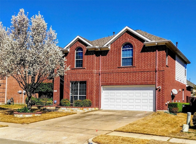 4924 Marsh Harrier Ave, Grand Prairie, TX 75052 - traditional home featuring concrete driveway, a garage, and brick siding