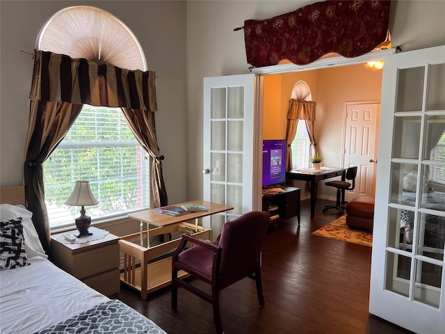 4924 Marsh Harrier Ave, Grand Prairie, TX 75052 - bedroom with a desk and dark wood-style floors