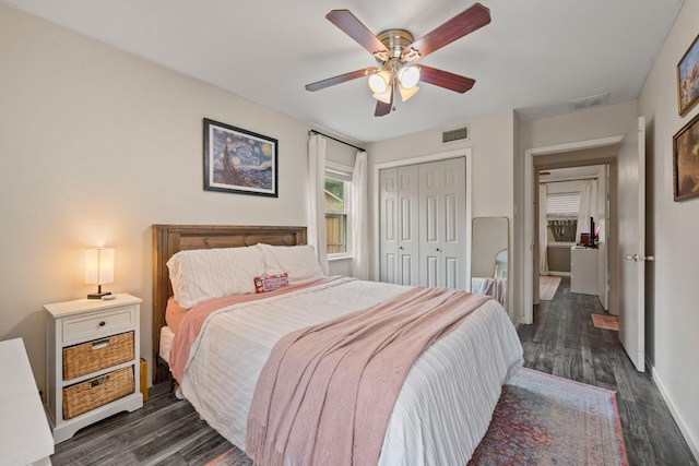 1218 Ridgeway Dr, Richardson, TX 75080 - bedroom featuring dark wood-style flooring, a closet, and ceiling fan