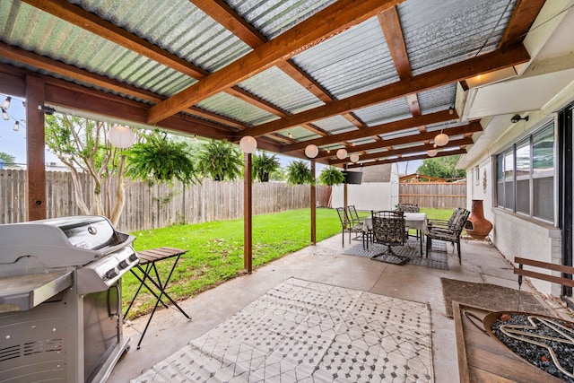 1218 Ridgeway Dr, Richardson, TX 75080 - fenced backyard with outdoor dining area, a grill, and a patio