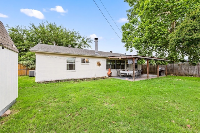 1218 Ridgeway Dr, Richardson, TX 75080 - rear view of property with a fenced backyard and a patio area