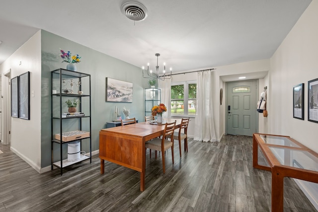 1218 Ridgeway Dr, Richardson, TX 75080 - dining space featuring dark wood finished floors and a chandelier