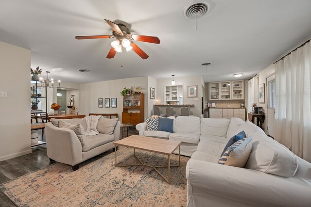 1218 Ridgeway Dr, Richardson, TX 75080 - living area featuring wood finished floors and a ceiling fan