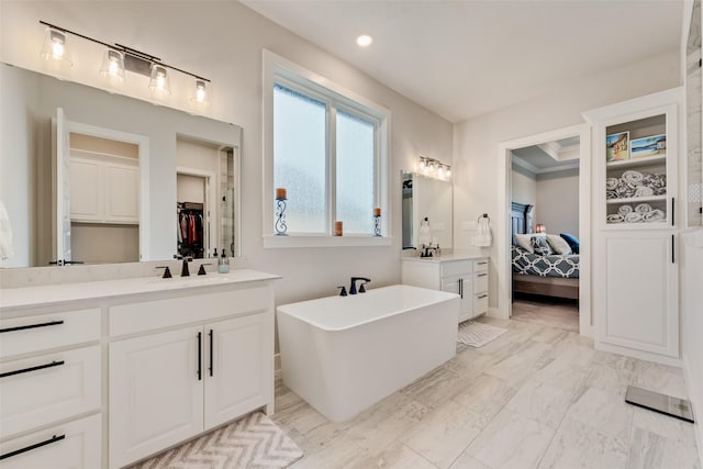 12480 Palmer Dr, Fort Worth, TX 76179 - full bath with vanity, a freestanding tub, a spacious closet, ensuite bath, and recessed lighting