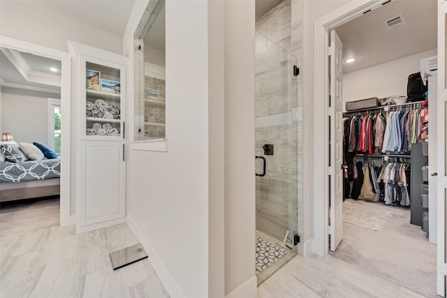 12480 Palmer Dr, Fort Worth, TX 76179 - ensuite bathroom with a spacious closet, a stall shower, recessed lighting, and marble look tiles