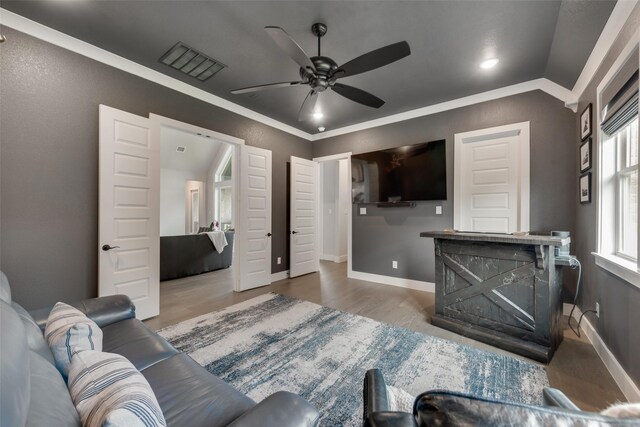 12480 Palmer Dr, Fort Worth, TX 76179 - living area with ceiling fan, wood finished floors, crown molding, and recessed lighting