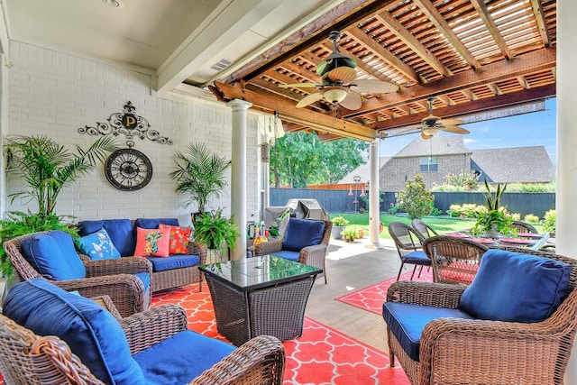 2310 Auburn Ct, Sherman, TX 75092 - fenced backyard featuring an outdoor hangout area, ceiling fan, and a patio