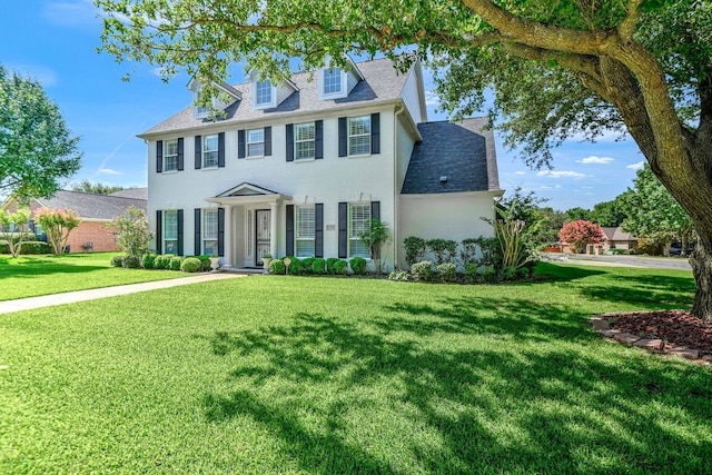 2310 Auburn Ct, Sherman, TX 75092 - colonial-style house with a front yard and a shingled roof